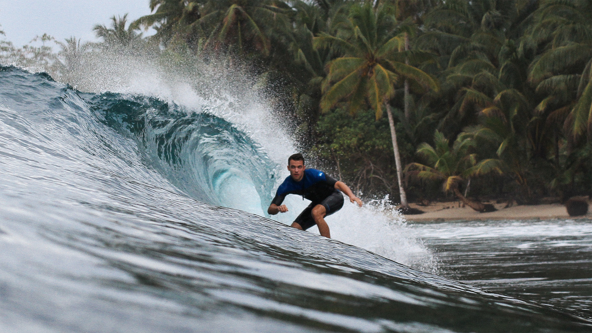 Tom surfing in the Mentawai islands of Indonesia